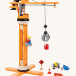 The PlanToys PlanWorld Crane Set  on a plain background. 
