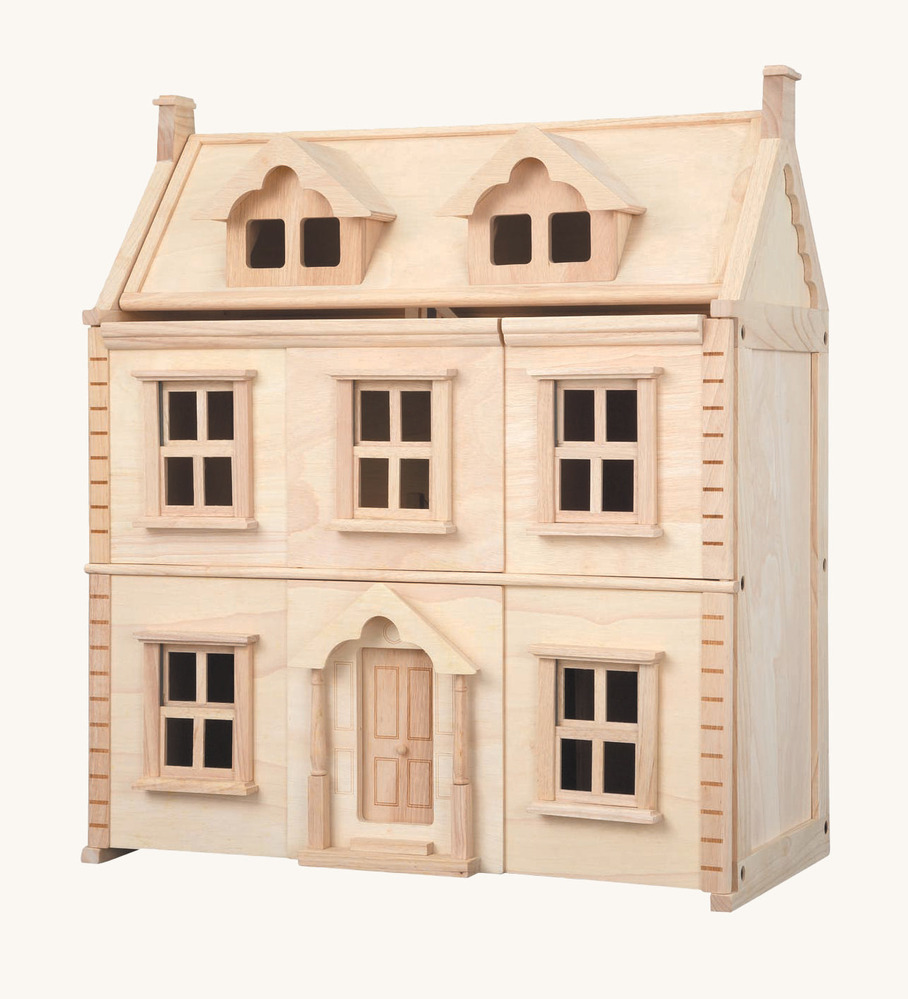 The PlanToys wooden Victorian Dolls House on a plain background. 