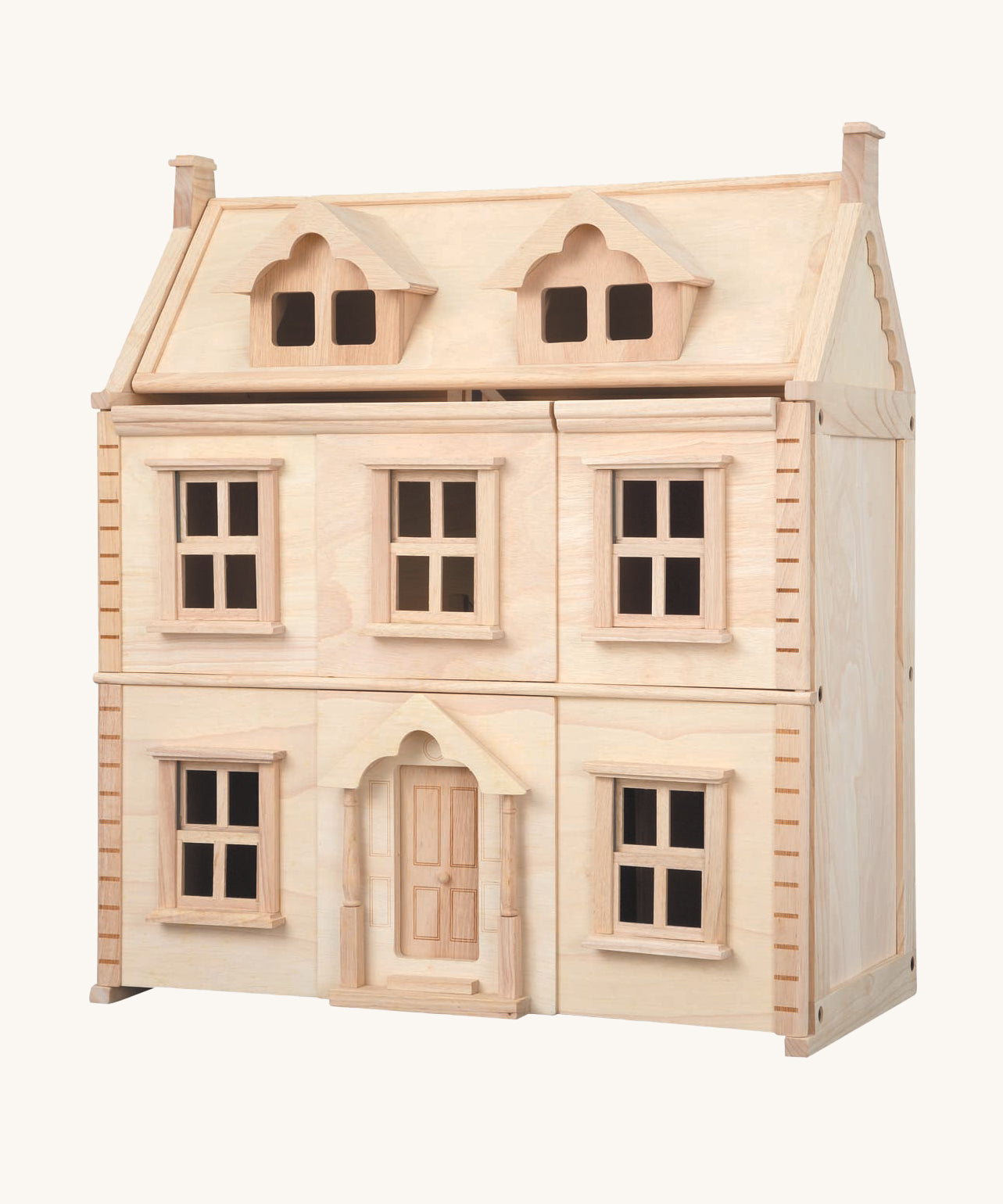 The PlanToys wooden Victorian Dolls House on a plain background. 