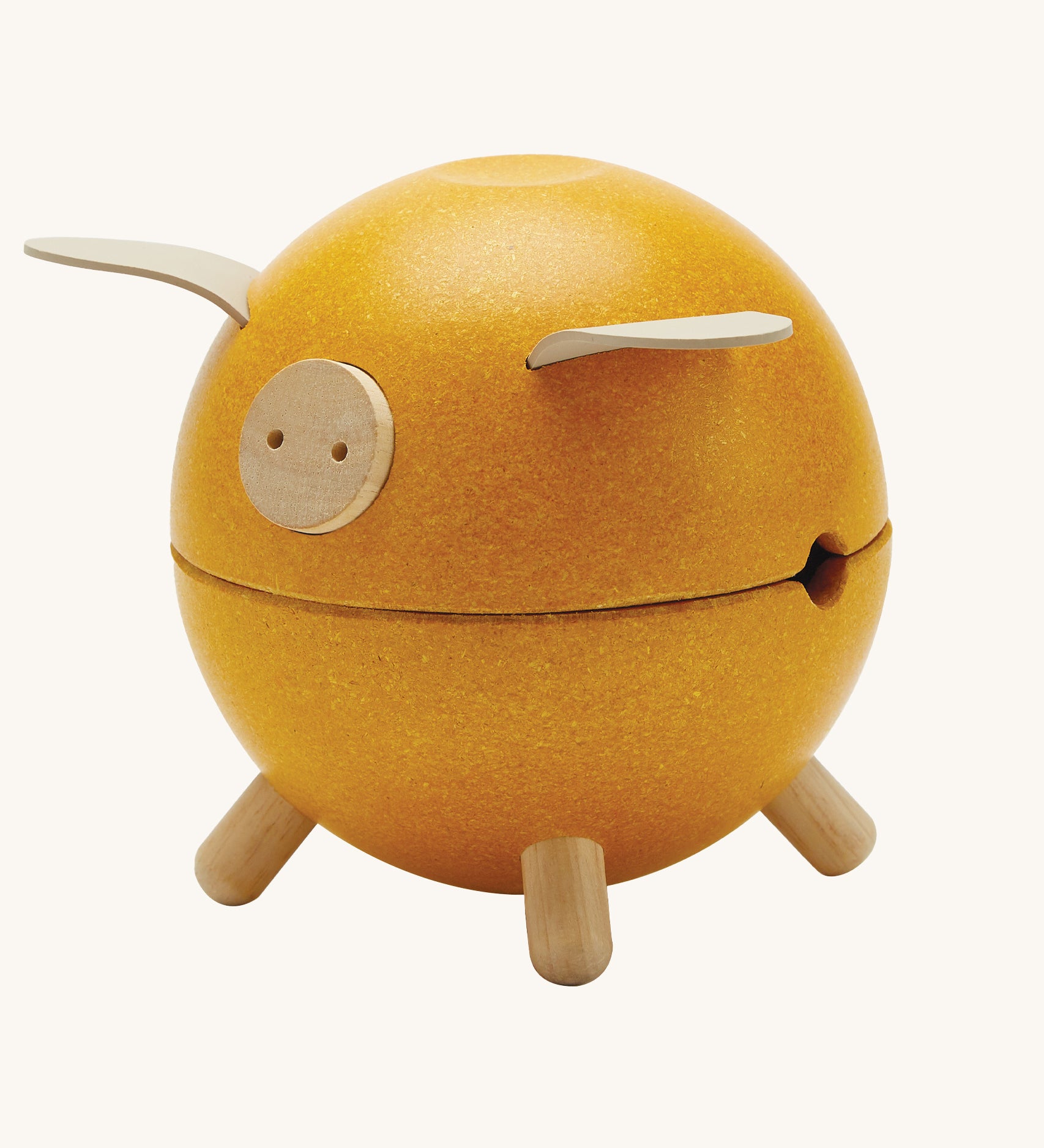 The PlanToys Yellow Piggy Bank on a blank background.
