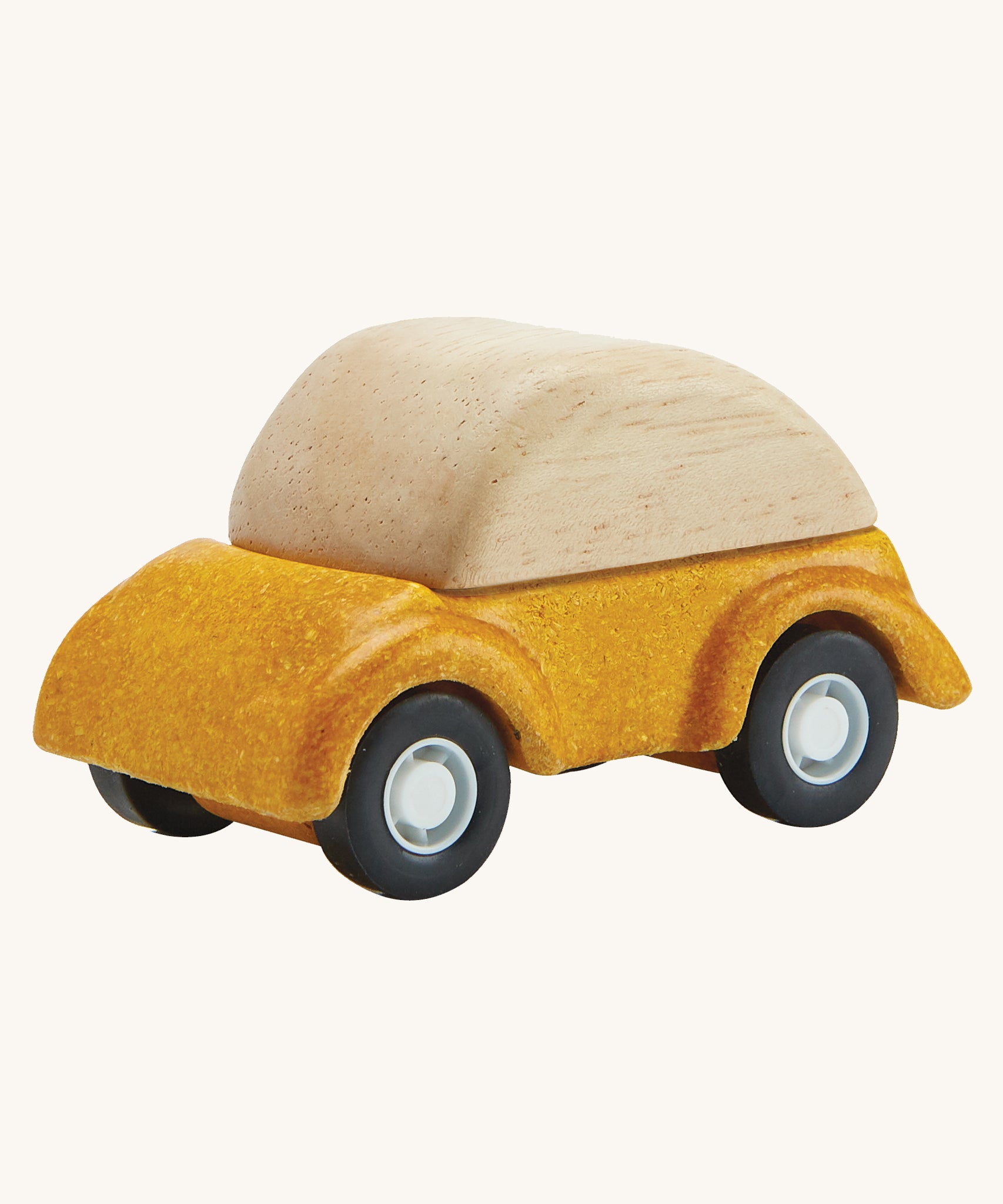 A PlanToys Yellow Car on a plain background. 
