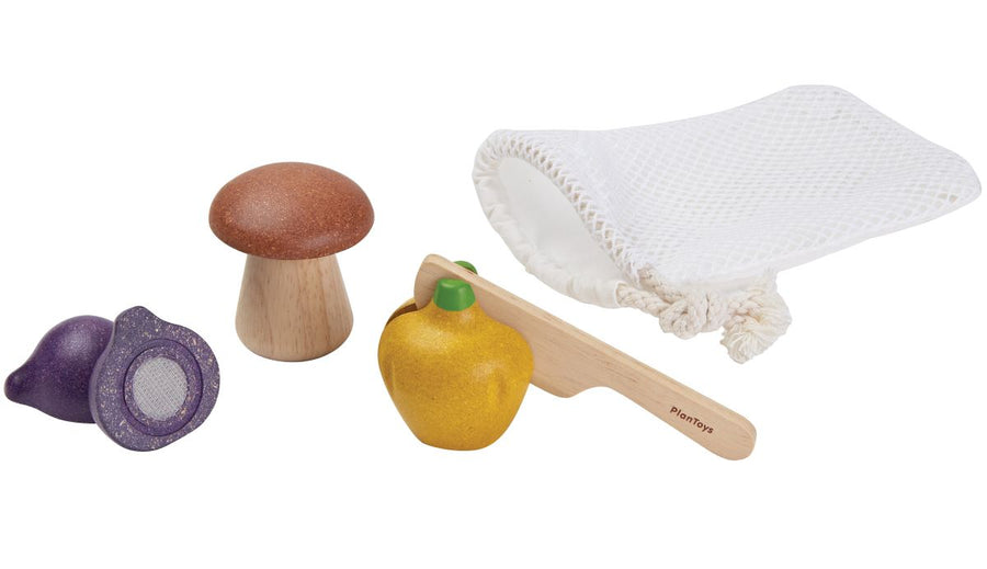 The veggie play food set from PlanToys includes a wooden bell pepper