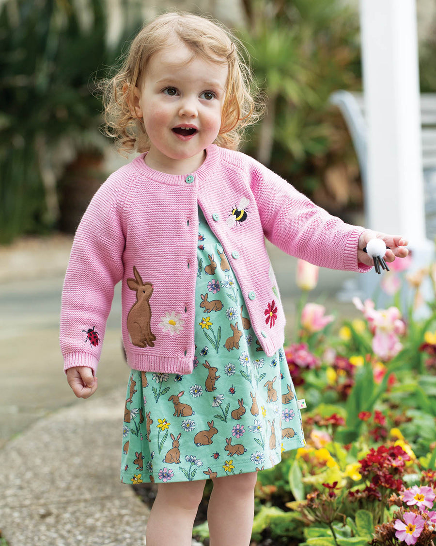 A closer view of the rabbit and flower applique detail on the pink