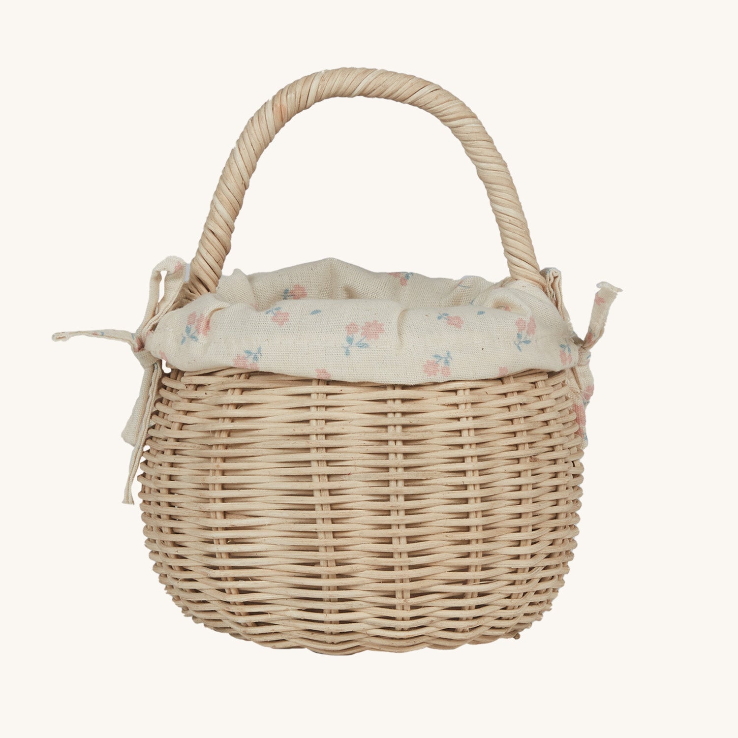 Olli Ella Rattan Berry Basket with Lining – Pansy Floral. A beautifully woven rattan basket with cream cotton lining with a vintage pansy floral pattern