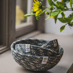 ReSpiin Jute Multicoloured Mini Bowl Set of 3 in the white and grey  colourway on a windowsill. 