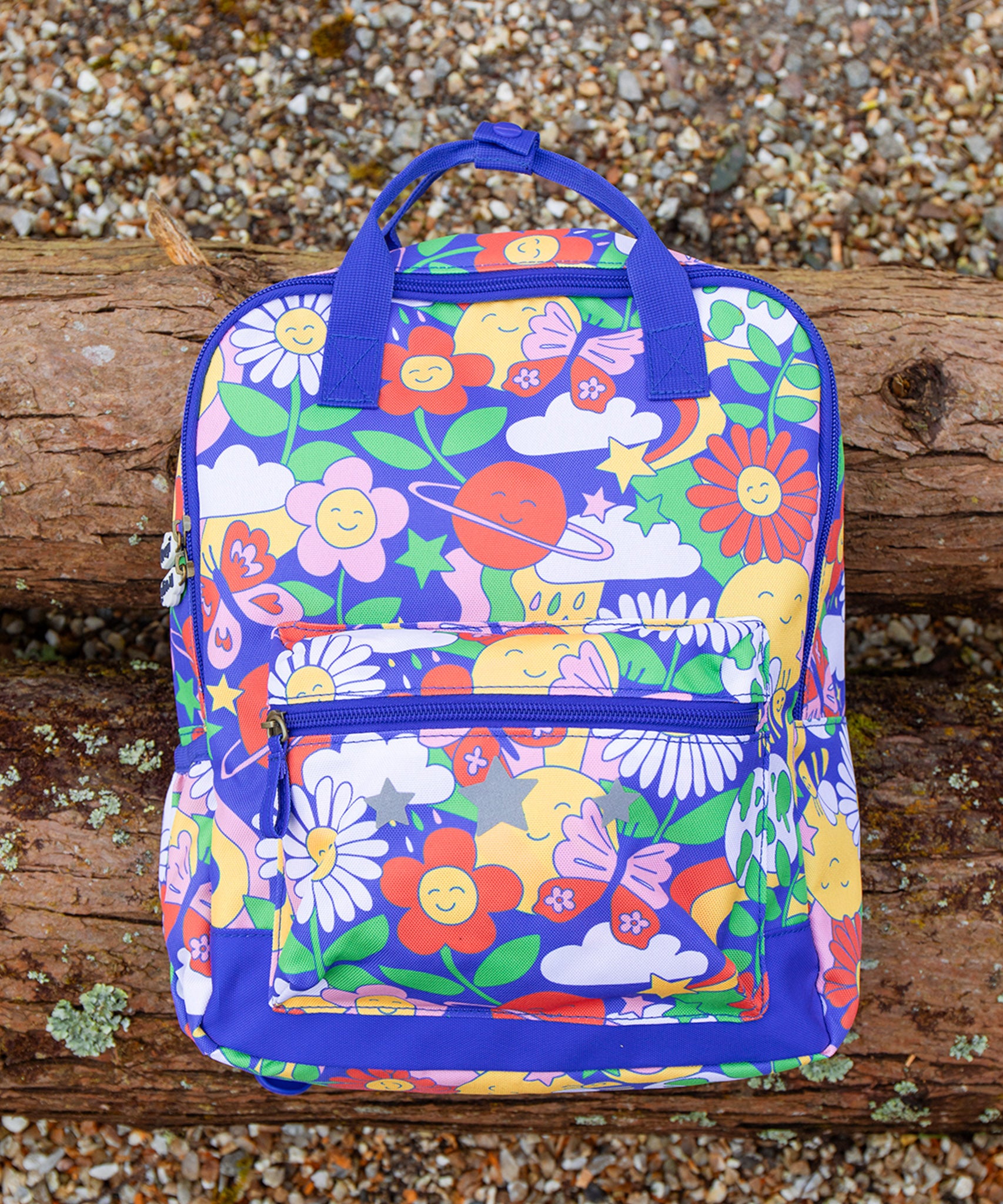 The Frugi cloud zipper tabs on the Frugi Explorers Backpack - Retro Happy