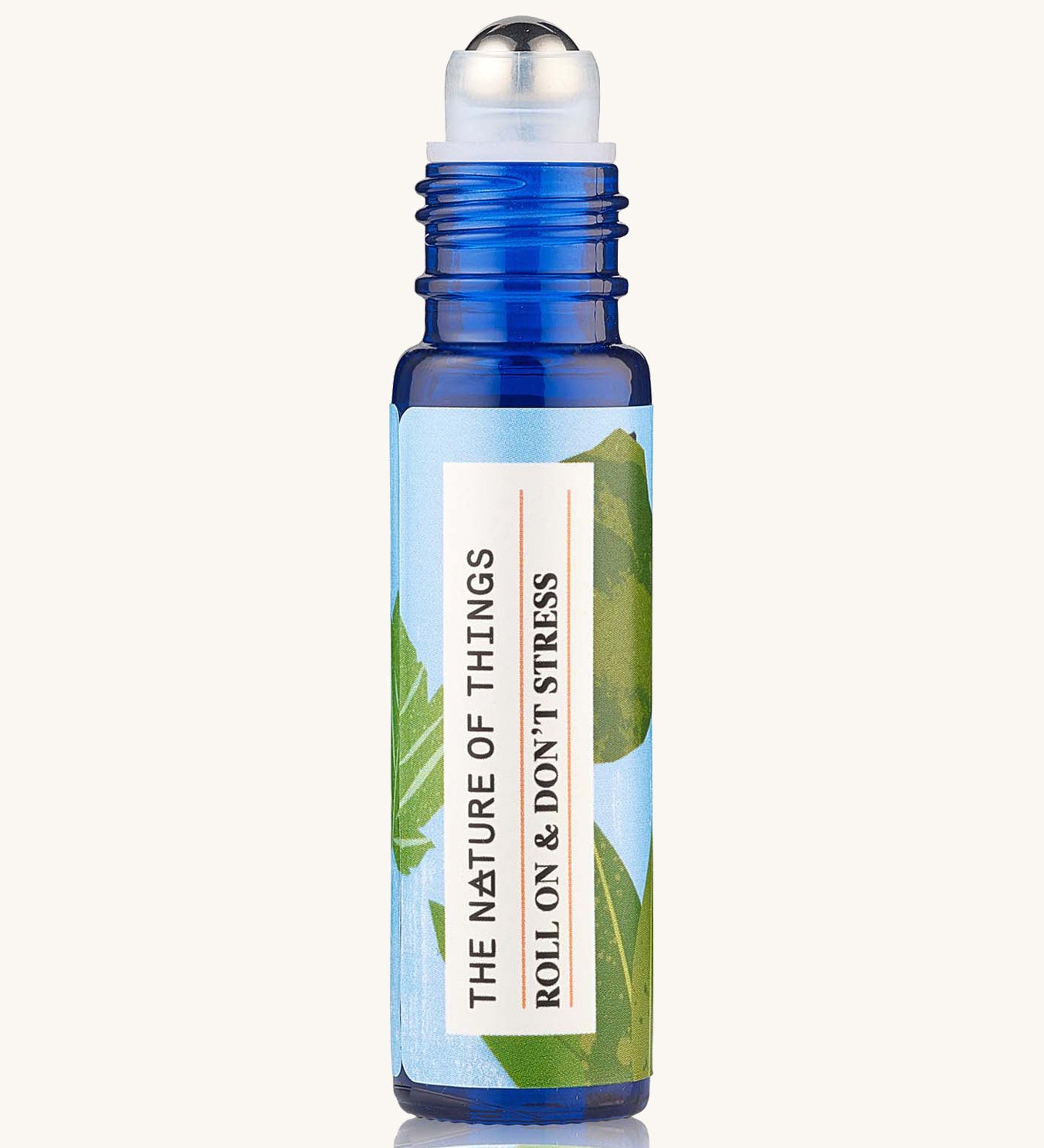 Roll On Don't Stress Essential Oil Blend a blue galss bottle showing roll-on applicator.