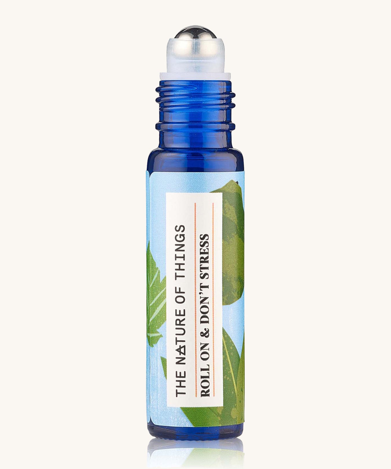 Roll On Don't Stress Essential Oil Blend a blue galss bottle showing roll-on applicator.