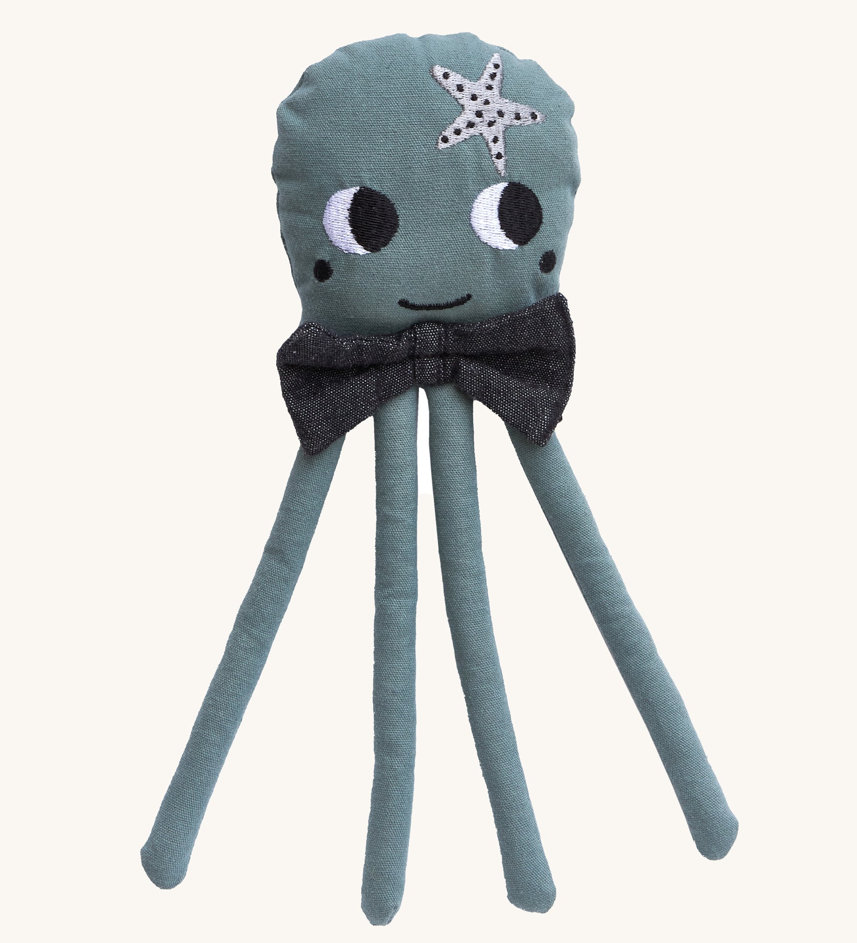 A Roommate octopus rag doll on a plain background. 