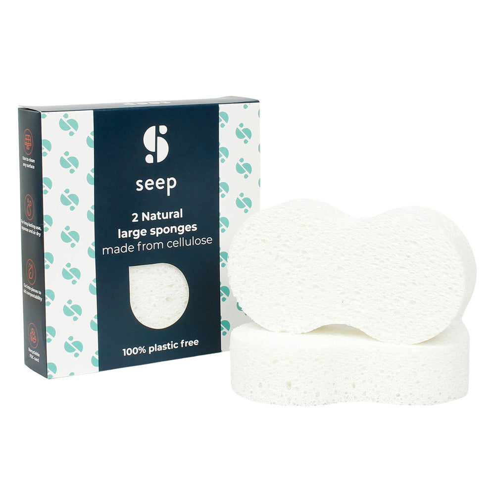 2 Seep large natural cellulose household sponges on a white background next to their cardboard packaging