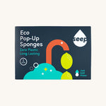 Seep eco pop up sponges in original cardboard packaging on a cream backround.