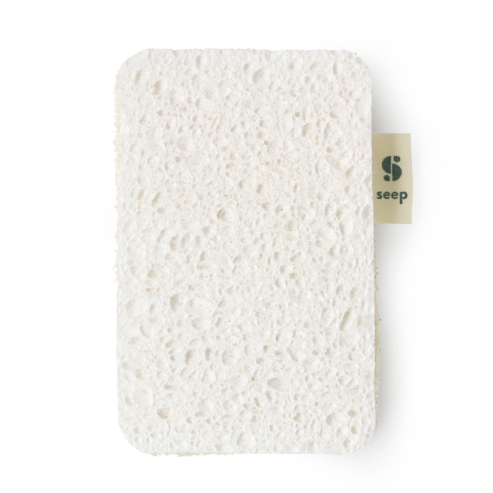 Close up of the Seep natural cellulose kitchen sponge on a white background