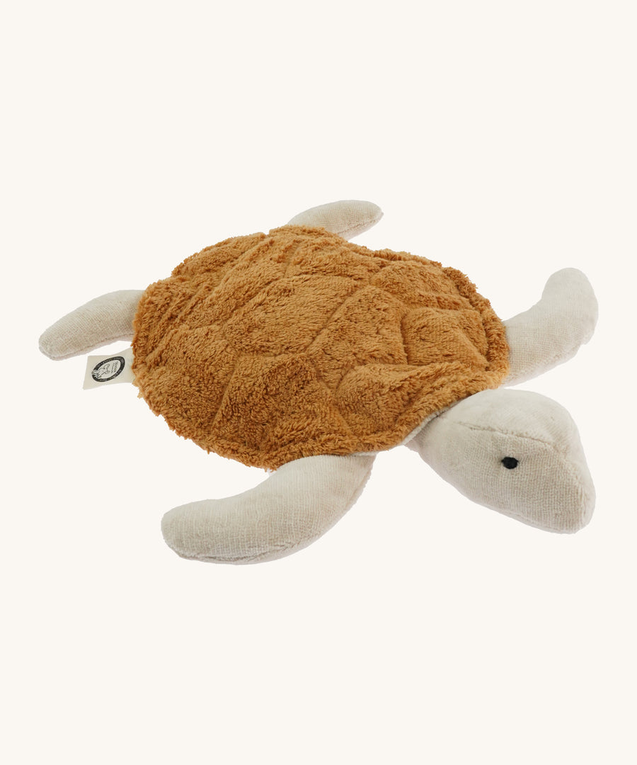 Senger Cuddly Rust Turtle - Small organic heatable soft toy on a cream background.