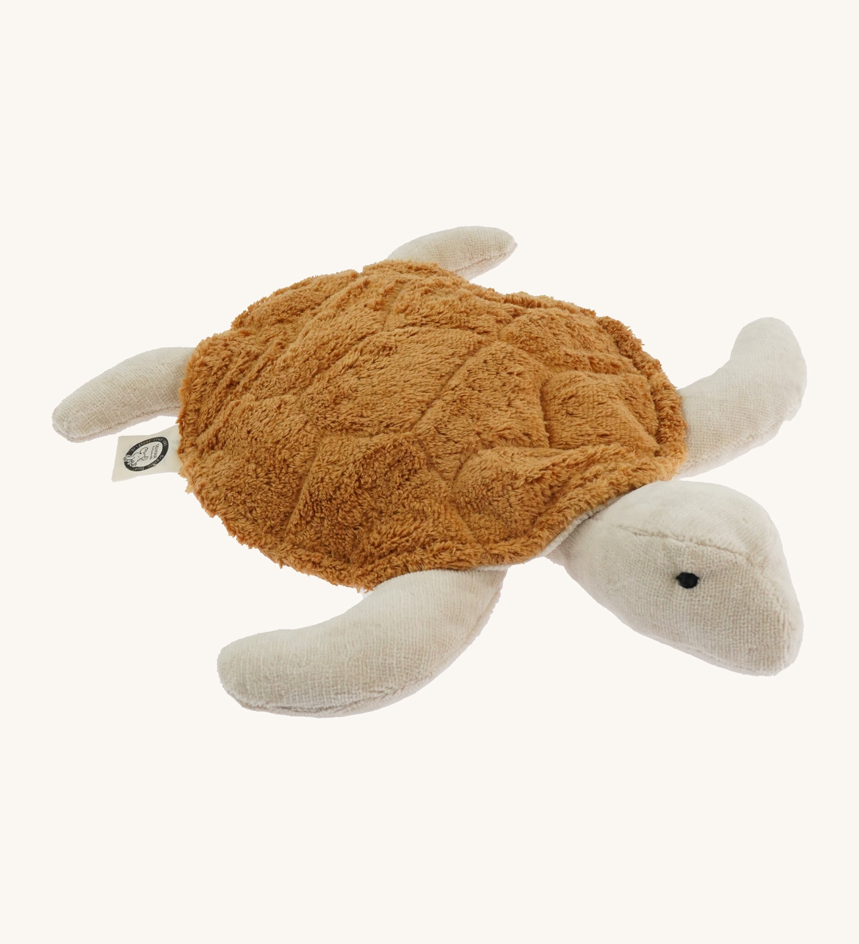 Senger Cuddly Rust Turtle - Small organic heatable soft toy on a cream background.