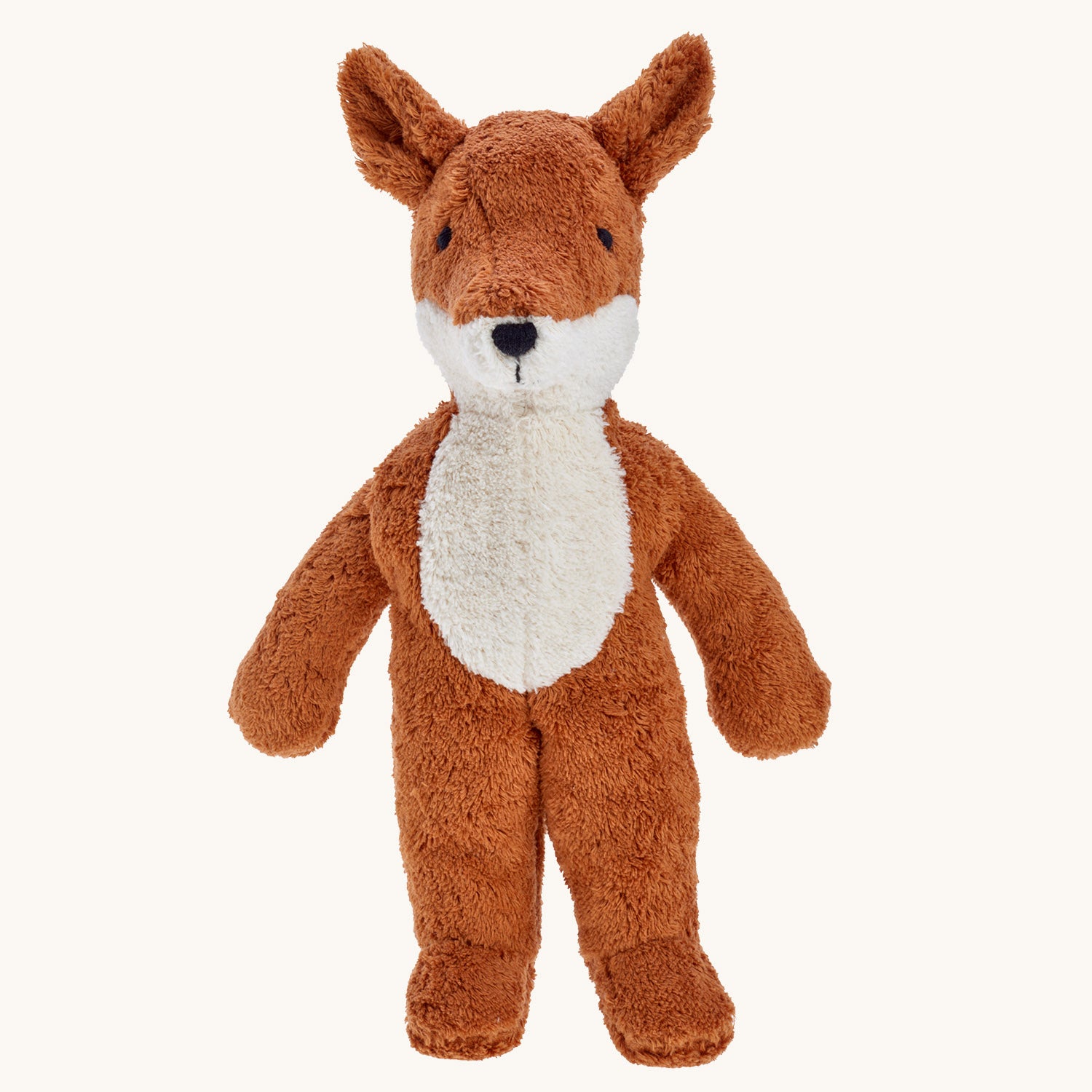 Senger Small Floppy Fox Toy. Sustainably-produced cotton and high-quality long-staple mohair that can easily be combed. The fox has a ginger body with a white belly and face from the nose down. On a cream background