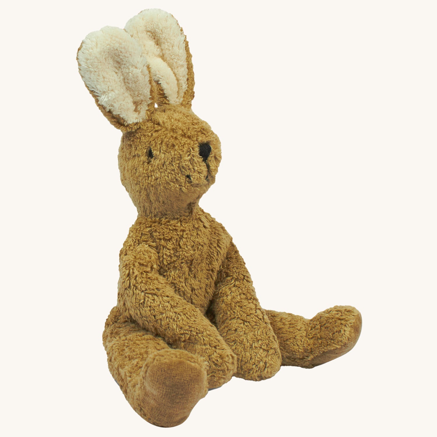 Senger Small Floppy Bunny Toy. Made using sustainably-produced cotton and high-quality long-staple mohair that can easily be combed. The Bunny is on a cream background