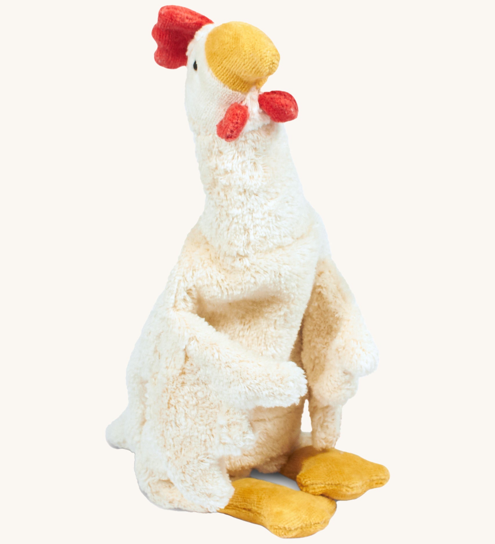 Senger Cuddly White Chicken - Small organic heatable soft toy on a cream background.