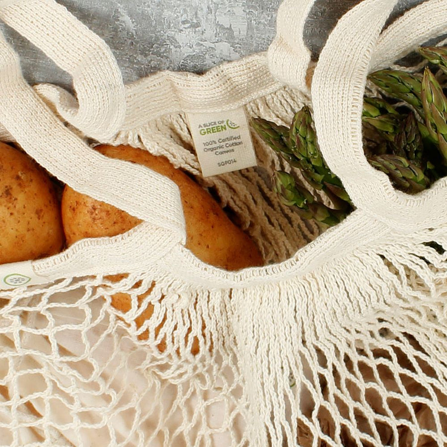 A Slice Of Green Organic Cotton Long Handled Shopping Bag open containing fresh fruit and veg