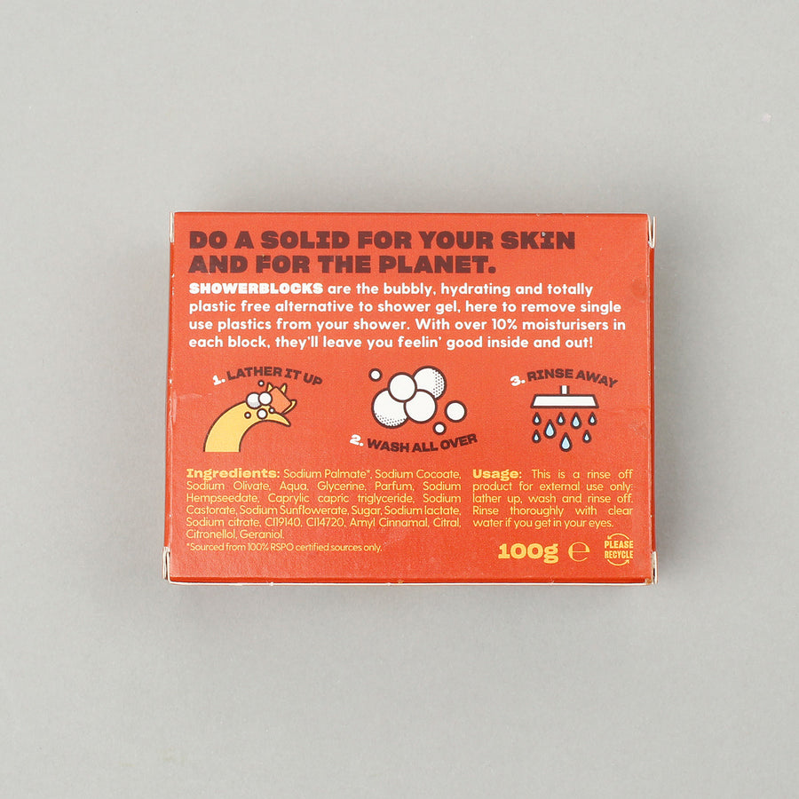 Image of the ingredients list on the box of the Shower Blocks Ginger & Agave Nectar Gel Bar pictured on a plain grey background