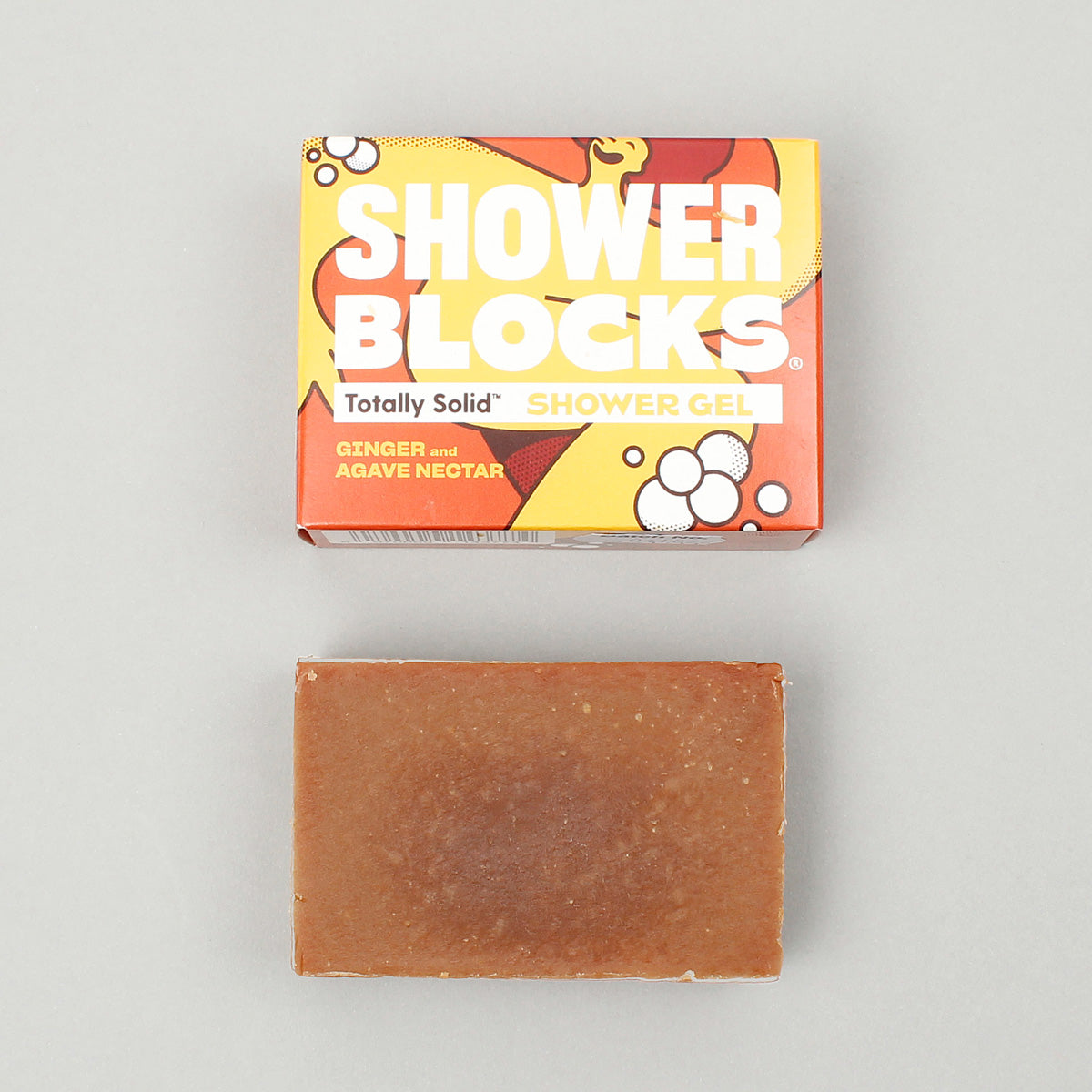 Shower Blocks Ginger & Agave Nectar Gel Bar pictured alongside packaging on a plain grey background