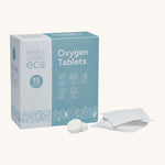 Simple Living Eco oxygen 15 pack tablets in original cardboard packaging with 2 opened tablets on a cream background.