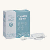 Simple Living Eco oxygen 15 pack tablets in original cardboard packaging with 2 opened tablets on a cream background.