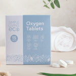 Simple Living Eco oxygen 15 pack tablets in original cardboard packaging standing on a table with 2 opened tablets 