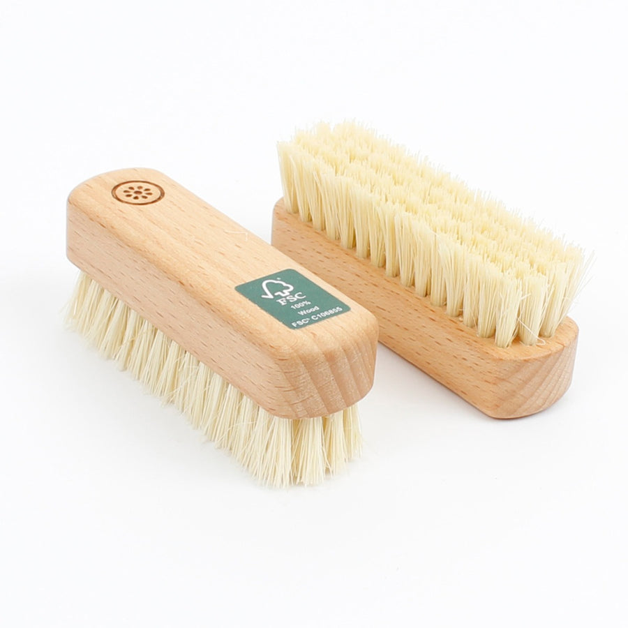 A Slice of Green plastic-free plant based nail scrubbing brushes on a white background