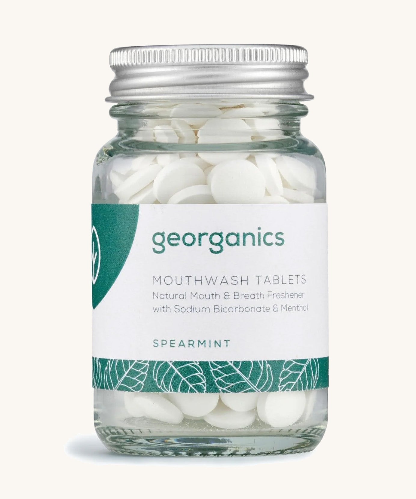 A Jar of the spearmint Georganics mouthwash tablets on a cream background