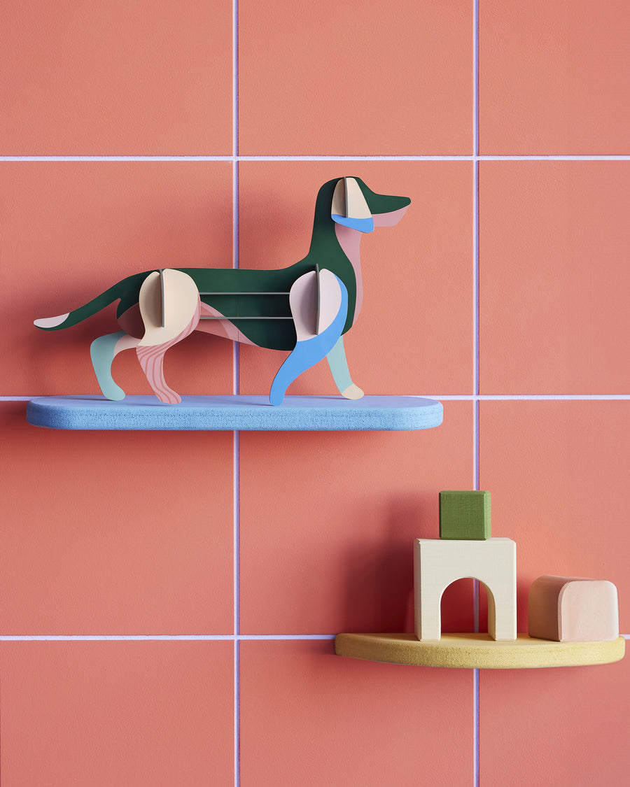  3D Art. A fun sausage dog model in shades of green