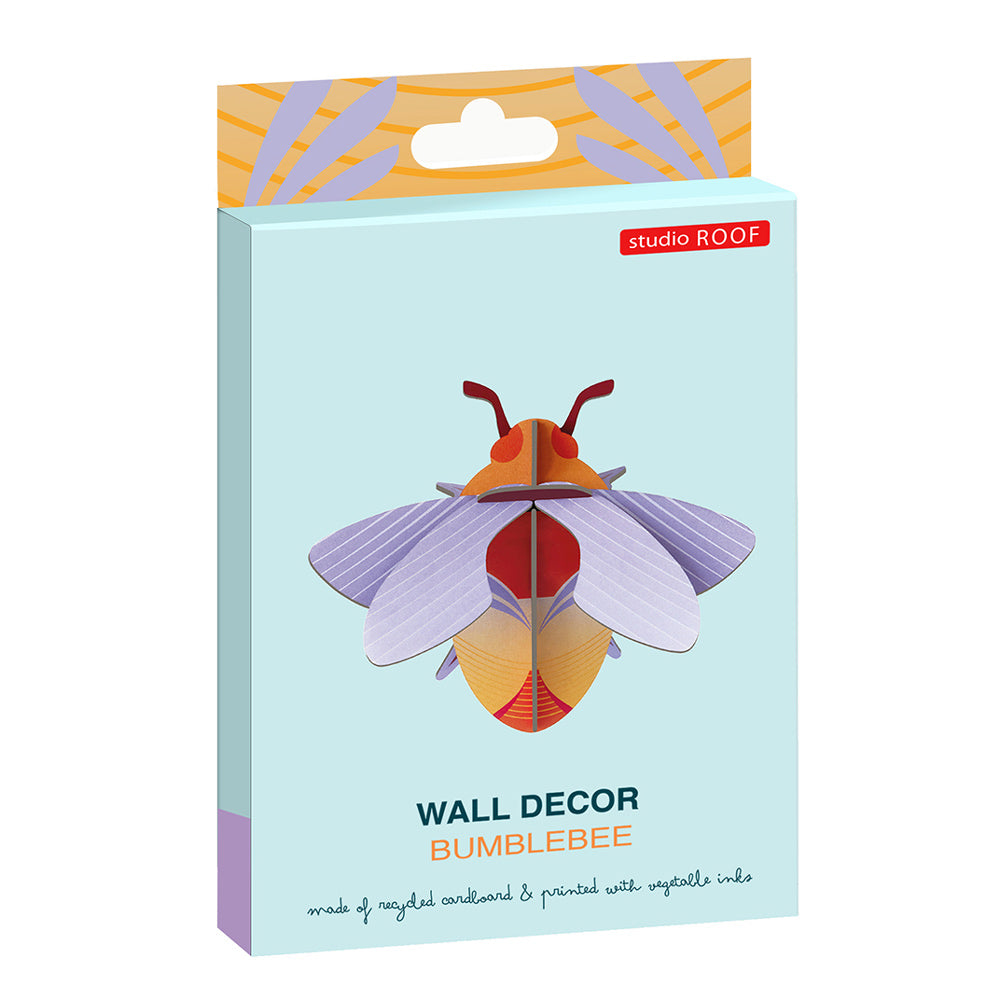 Packaging for the Studio roof cardboard bumblebee wall decoration on a white background