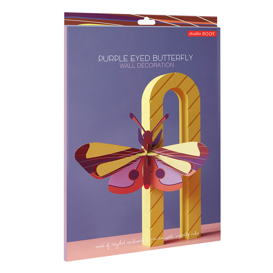 Packaging for the Studio roof purple eyed butterfly cardboard craft kit on a white background