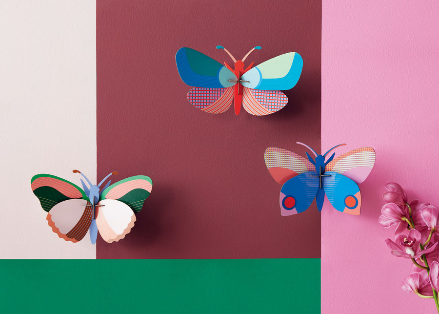 A collection of Studio Roof Butterfly wall decorations