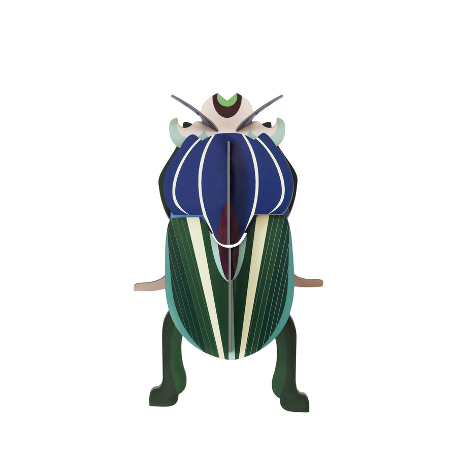 Studio Roof Mimela Scarab Beetle decoration pictured on a plain background