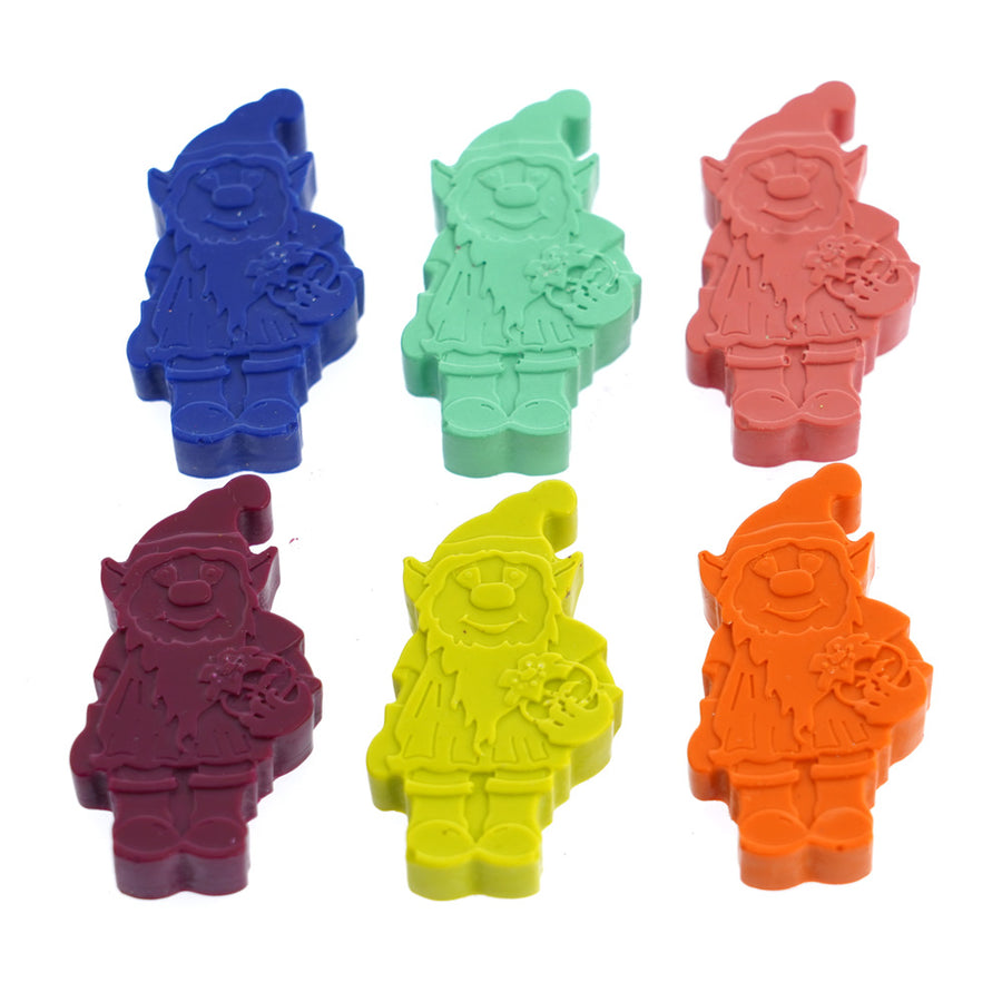 The crayon bug handmade coloured elf crayons set laid out on a white background