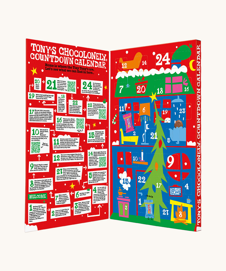 The open red coloured box of Tony's Chocolonely advent calendar on a cream background