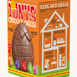 Tony's salted caramel sea salt chocolate hollow Easter egg in a orange cardboard box on a plain background, the box is at an angel showing the side of the box.