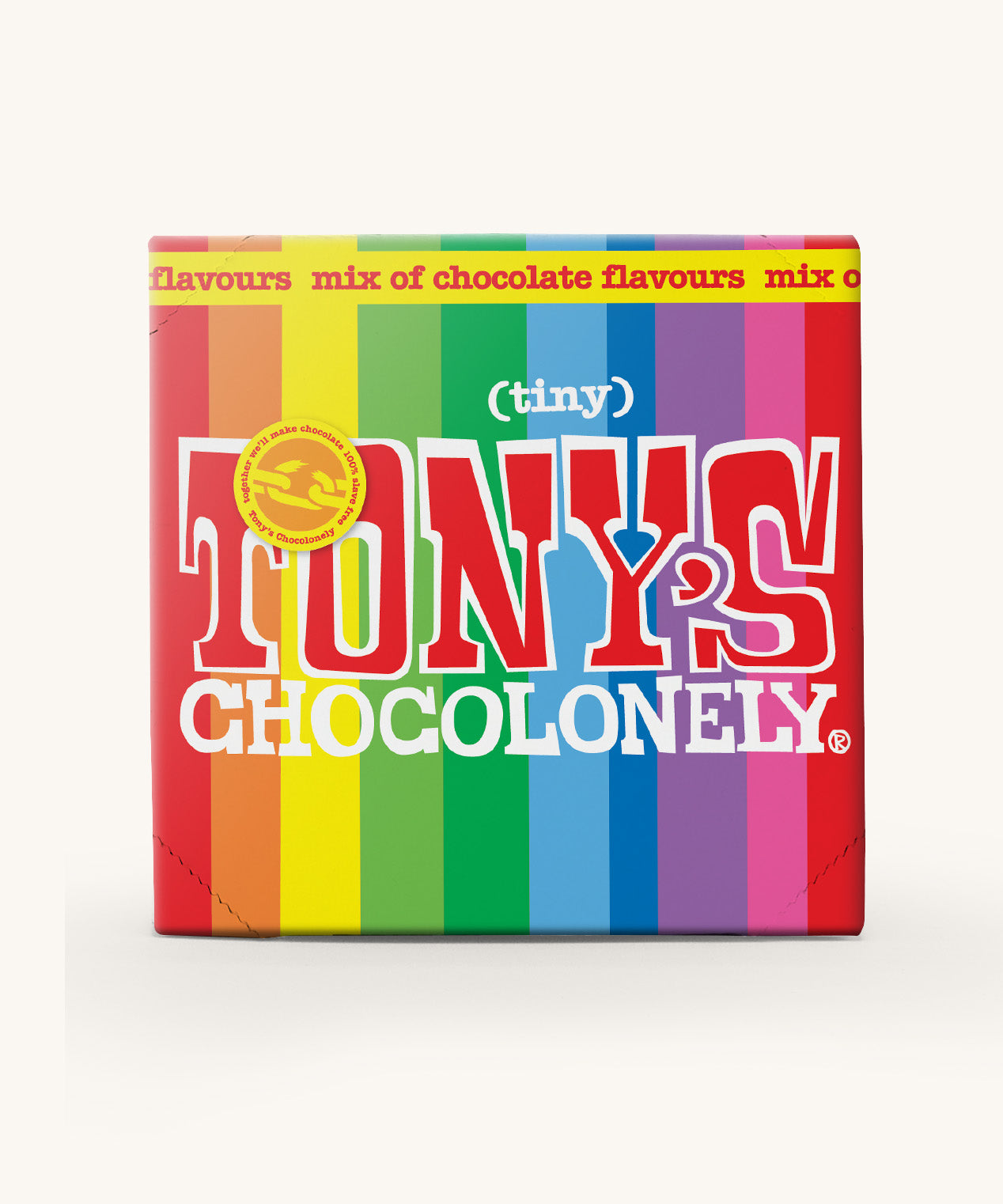 The rainbow coloured box of Tony's Chocolonely Tiny Tony's Gift Box on a cream background