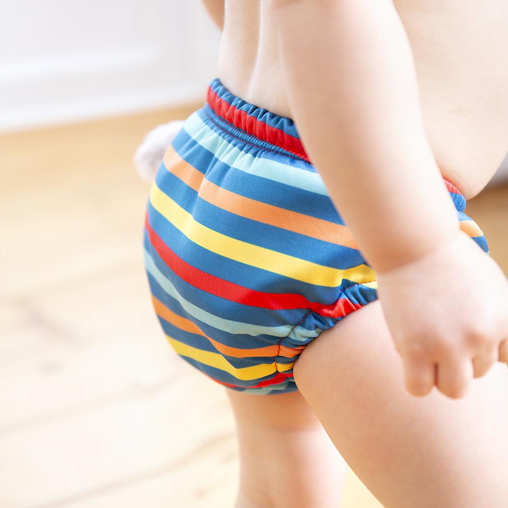 Close up of toddler wearing the Totsbots eco-friendly swim stripe reusable swim pants 