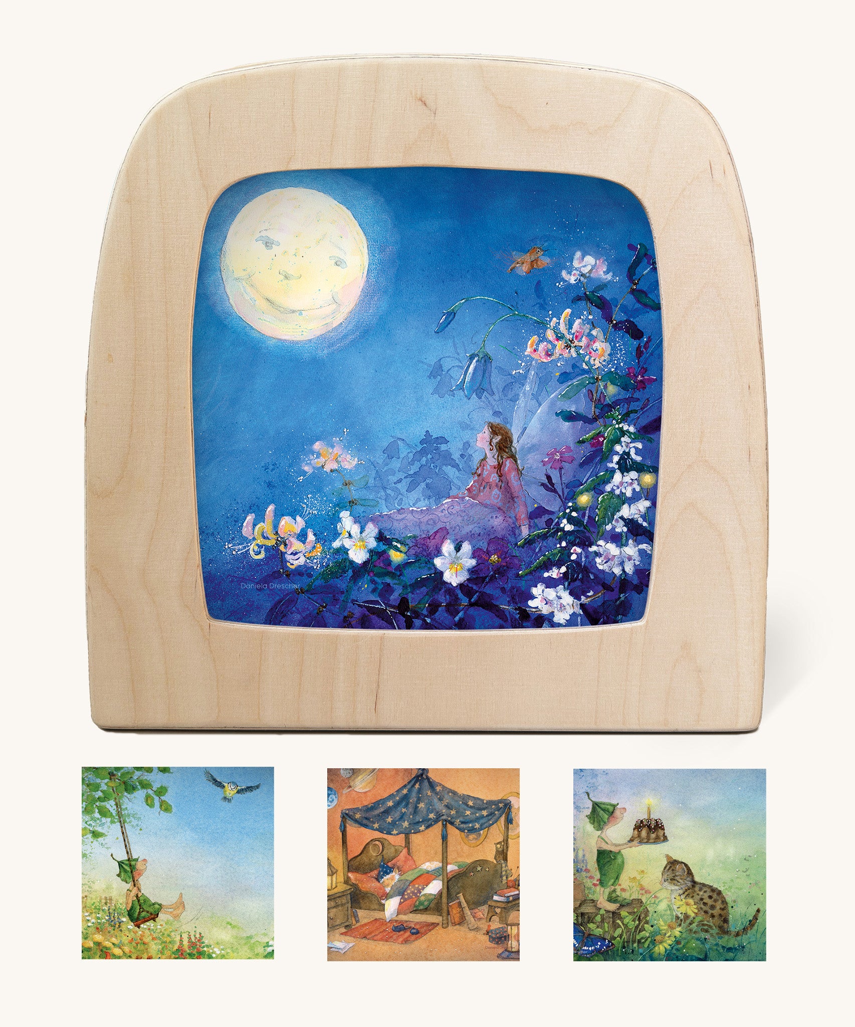 Toverlux Magic Lamp Silhouettes - Artwork By Daniela Drescher. Shown in the image is: Little Fairy Can't Sleep - Moon, Griswald Hears The Grass Grow - Swing, Griswald Hears The Grass Grow - Cake and Goodnight Sandman - Nighty Night. The images are on a cream background