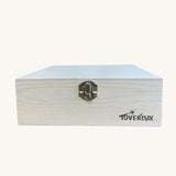 Toverlux Magic Lamp Silhouette Storage Box. A small wooden storage box perfect for storing all your Magic Lamp Silhouette's, on a plain background. The box is shown closed with the metal clasp on teh front. 