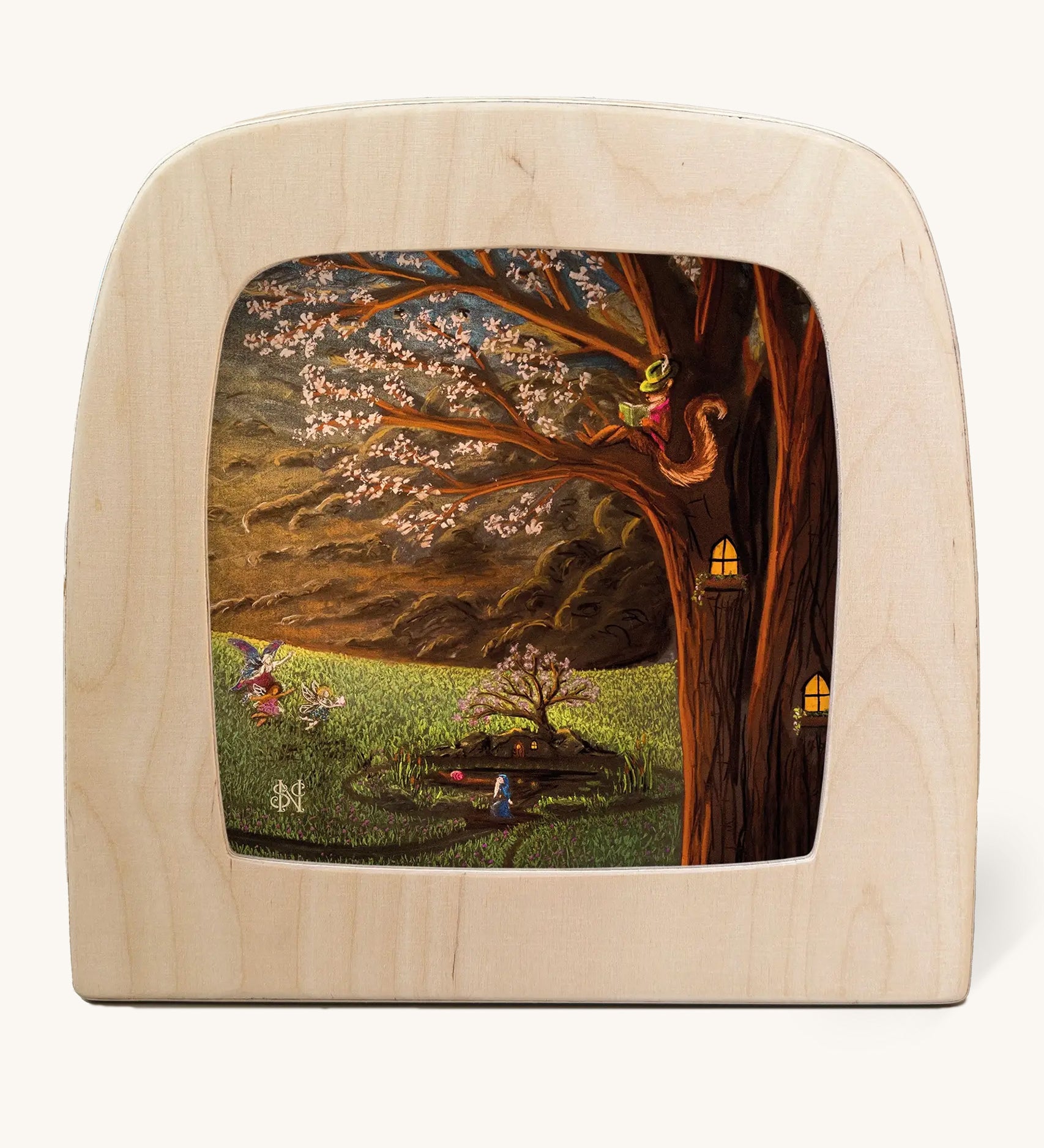 Toverlux Magic Lamp with a April silhouette by artist Nathaniel Santa Cruz. A chalk style illustration showing a blossom tree with a red squirrel overlooking a grassy field with fairies. 