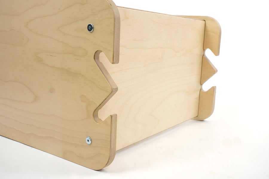 Close up of the fixing mechanism on the Triclimb wooden enclosure on a white background