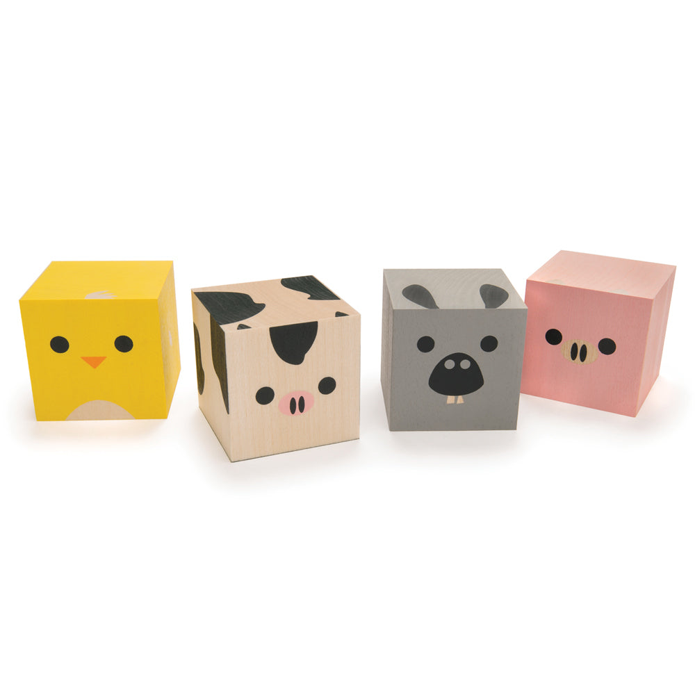 Uncle goose plastic free wooden farm cubeling blocks lined up on a white background