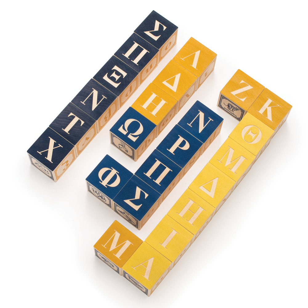 Uncle Goose wooden Greek language blocks laid out on a white background