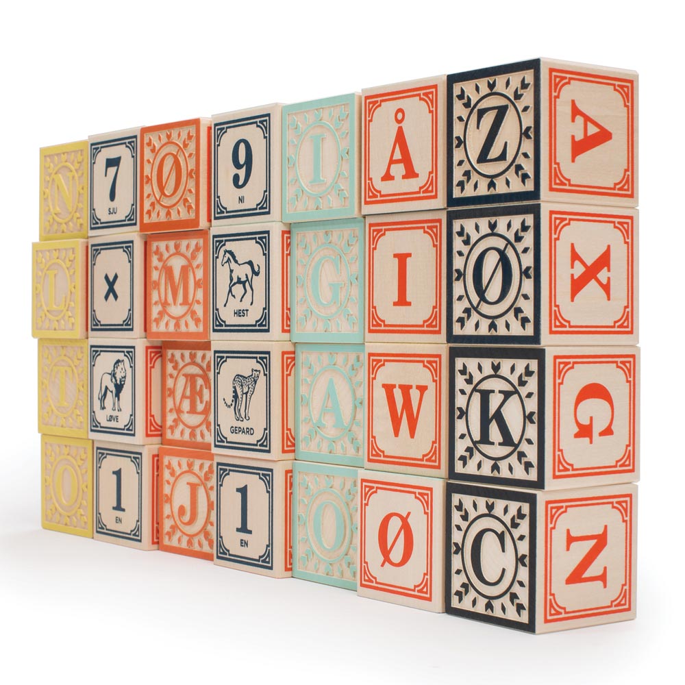 Uncle Goose eco-friendly wooden Norwegian language blocks stacked in a rectangle shape on a white background