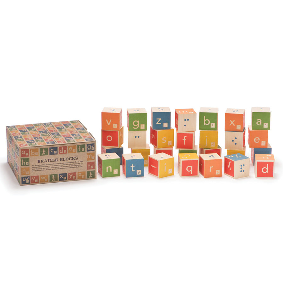 Uncle Goose plastic free Braille alphabet blocks stacked on a white background next to their box