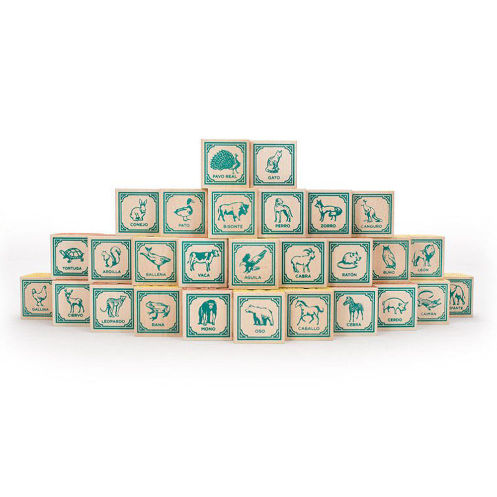 Uncle Goose Spanish animal toy blocks stacked in a pyramid on a white background