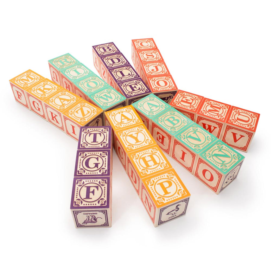 Uncle Goose Swedish plastic free wooden language blocks laid out on a white background