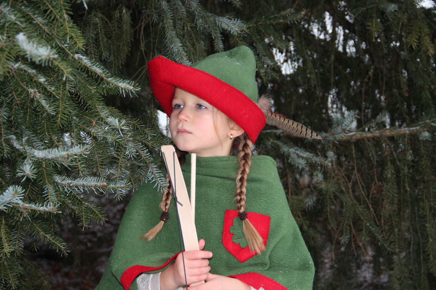 Child wearing the Vah robin hood costume cape and hat